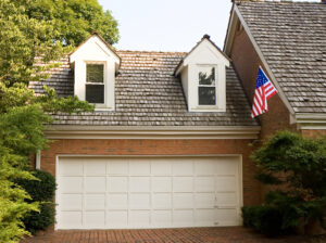 Residential Garage Door Repair Brentwood TN A luxury house with a large white garage door.